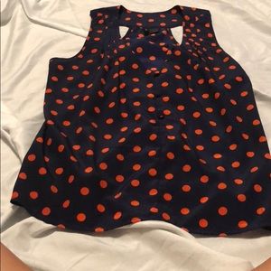 Navy blue blouse with orange polkadots